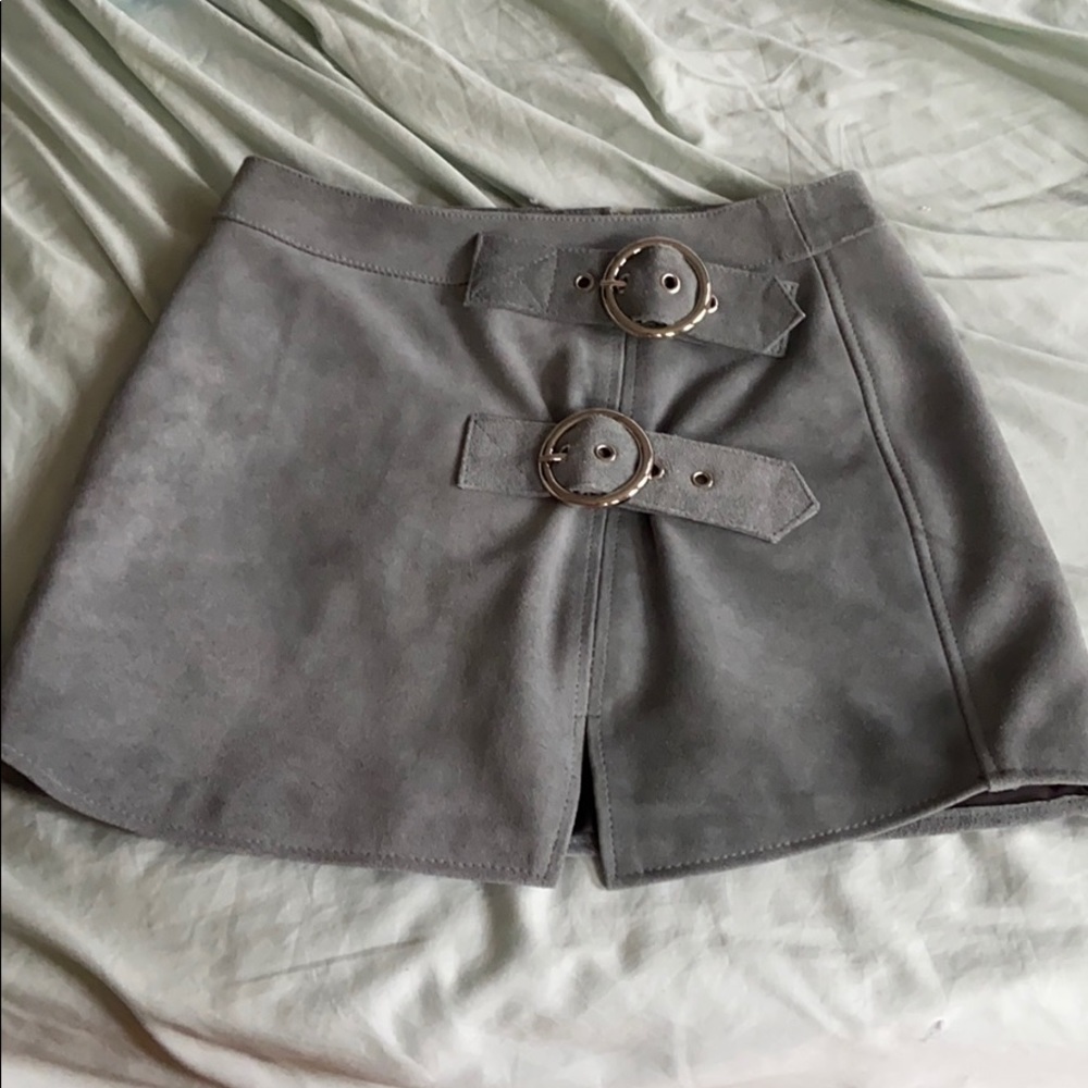 Brand new skirt with buckles